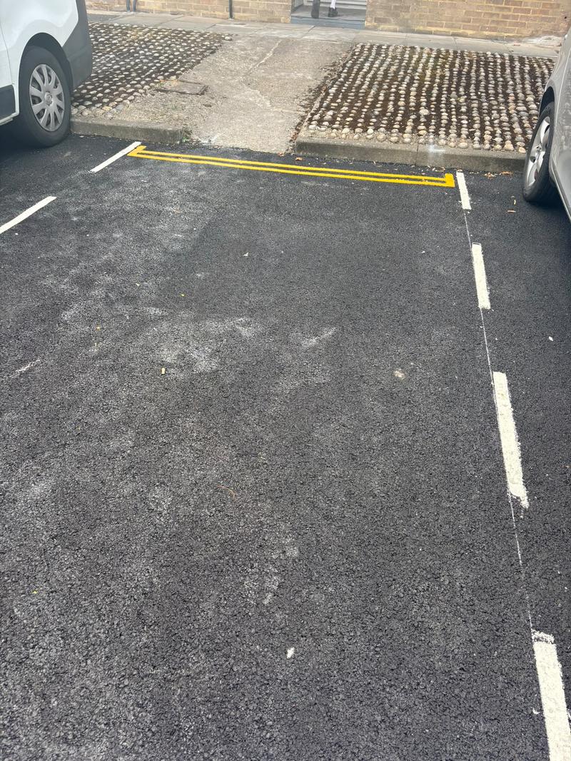 Parking space after the pictured waste was removed